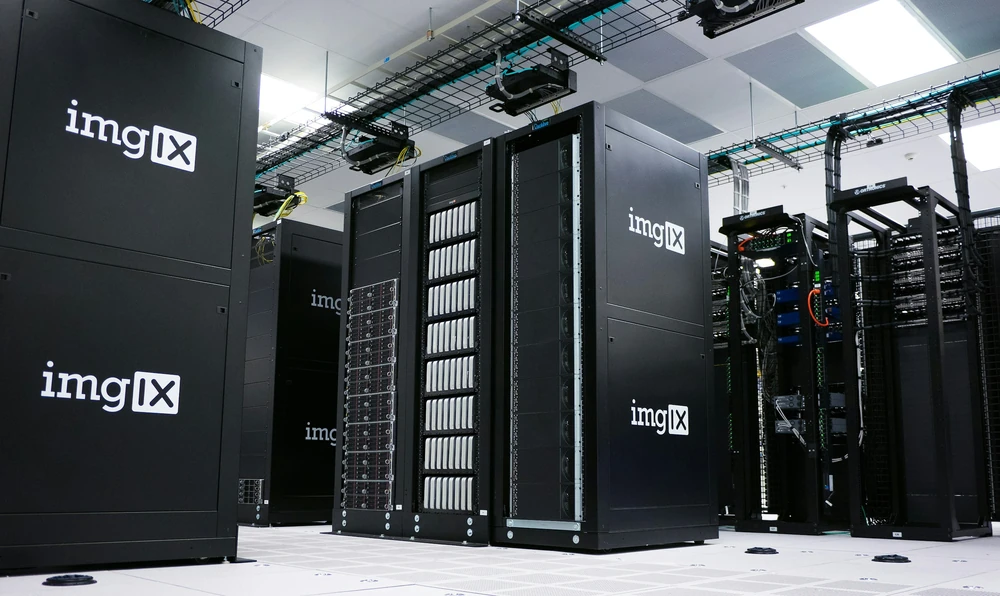 Server racks in a data centre with external computing infrastructure.