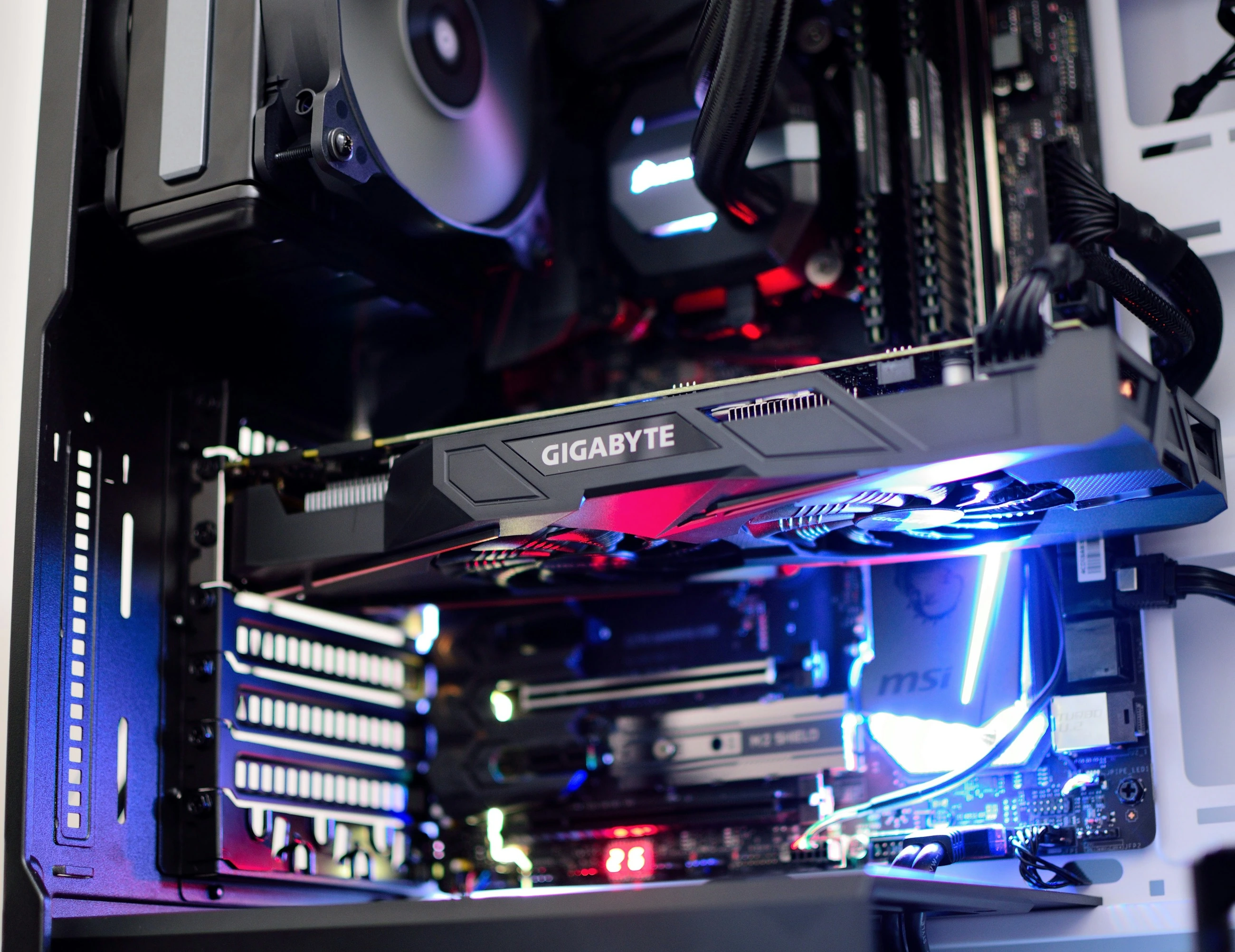 A graphics card with cooling fans for local computing power.