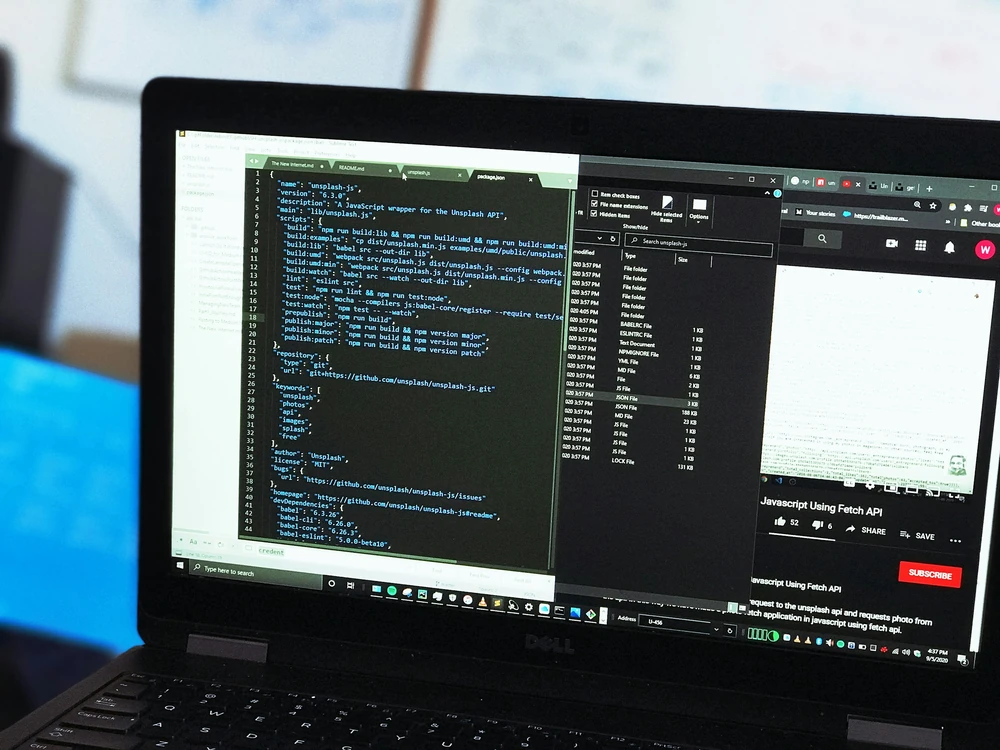 A workspace with software on a laptop screen.
