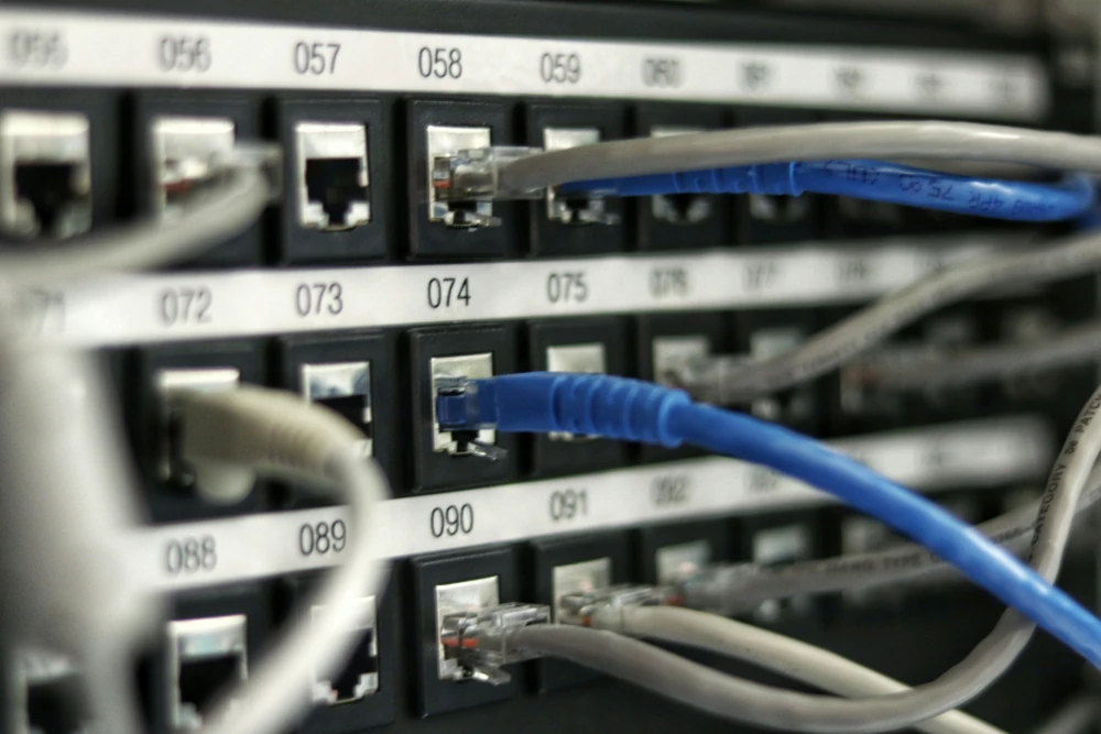 Network cables connected to server equipment.